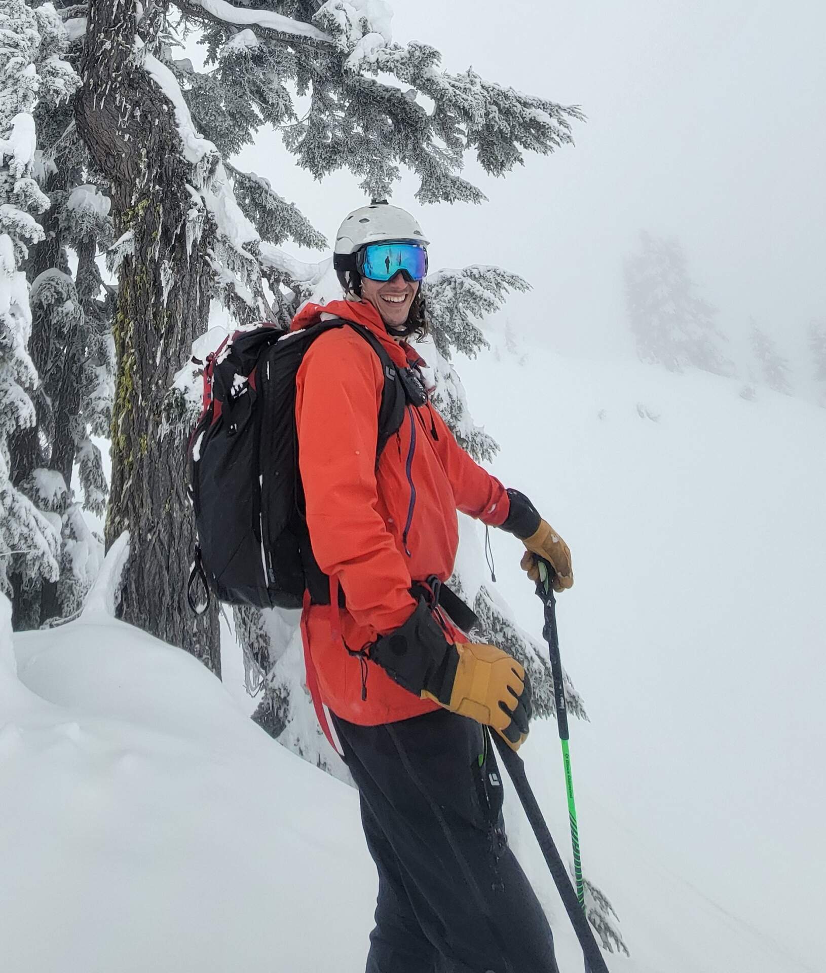 kenny ski photo GNPG safety guides leading a group through Montana backcountry terrain