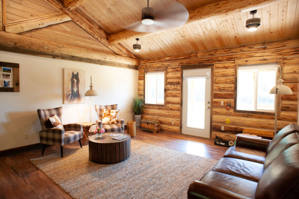 Lounge area with cozy sofas at Bar W guest ranch cabins
