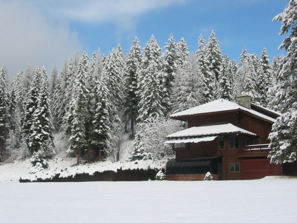 Winter scene of Bar W Ranch blanketed in fresh Montana snow.